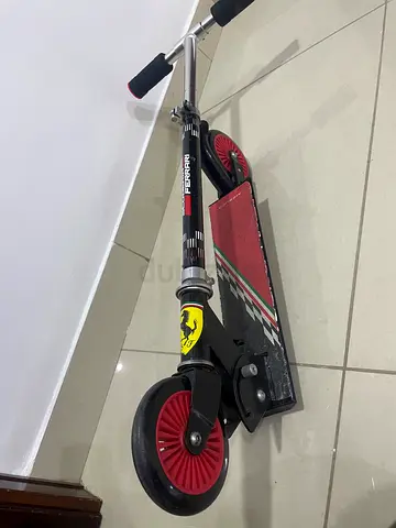 Ferrari foldable kick scooter with large wheels - used, good condition