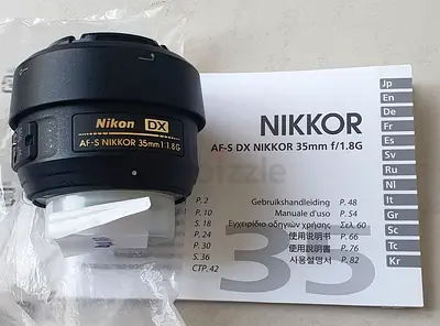 Nikon AF-S DX NIKKOR 35mm f/1.8G lens - Excellent condition with caps & manual