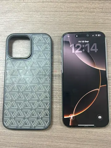 iPhone 16 Pro Max with protective case - Excellent condition