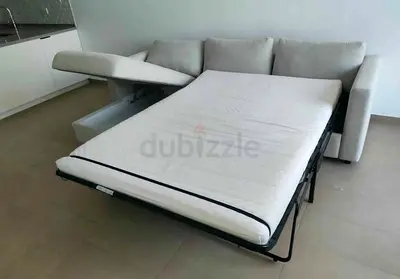 Light grey 3-seater sofa bed with storage, gently used