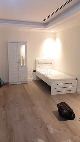 Stylish new single bed with mattress with two door cabinet available