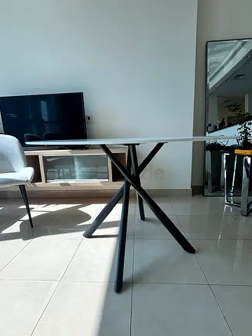 Minimalist white dining table with black metal legs - good condition