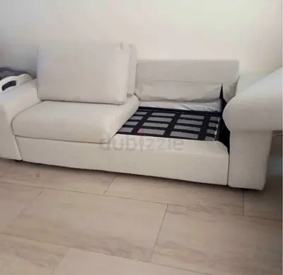 Light beige seater sofa with pull-out bed frame (needs mattress)