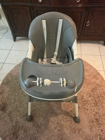 Grey baby high chair with tray