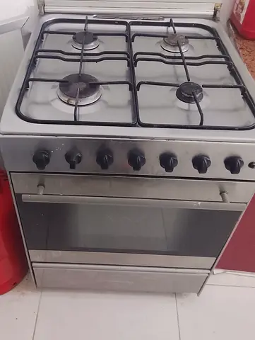 Used 4-Burner Gas Stove / Cooker - Functional, Needs Cleaning