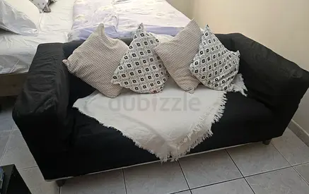 Ikea 3-Seater Sofa in Good Condition with free extra color grey cover.Throws not included