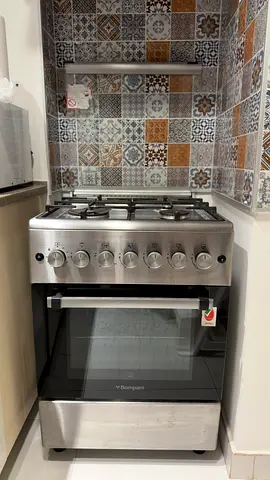 Stainless Steel 4-Burner Bompani Gas Cooker with Oven - Good Condition