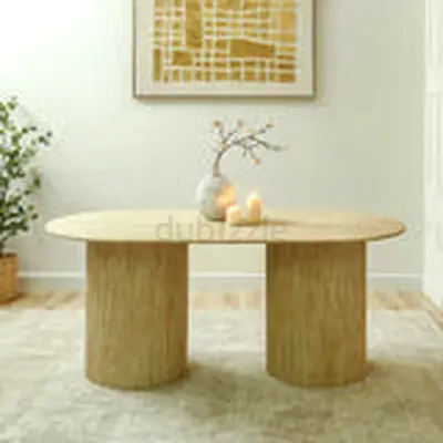 Travertine oval coffee table with rounded pedestal legs