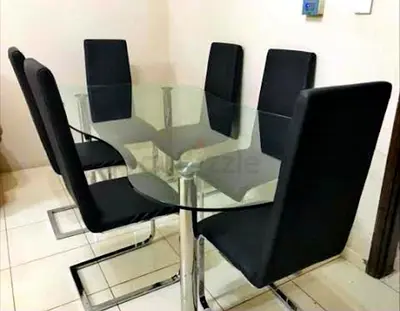 Glass Top Dining Table with 6 Black Upholstered Chairs