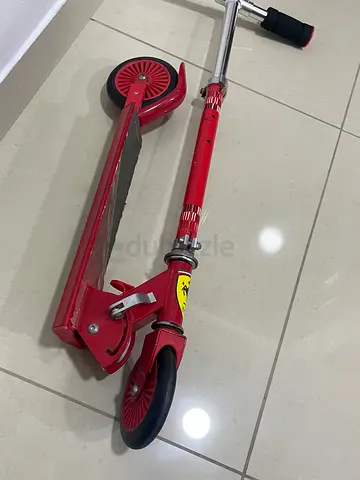 Ferrari red foldable kids kick scooter - good used condition