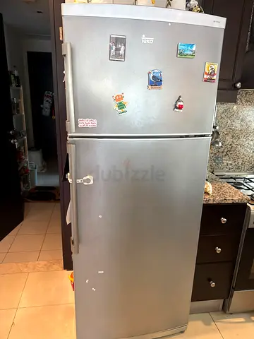 Teka Silver Double Door Refrigerator - Good Working Condition. Child lock provided.