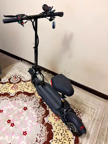 Electric Scooter with Seat - Good Condition, Ready to Ride