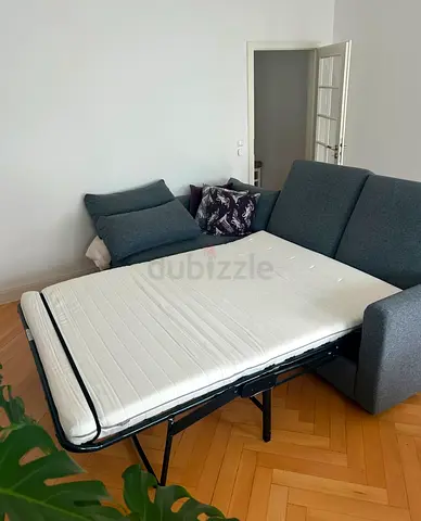 Grey fabric sofa bed with mattress - good condition