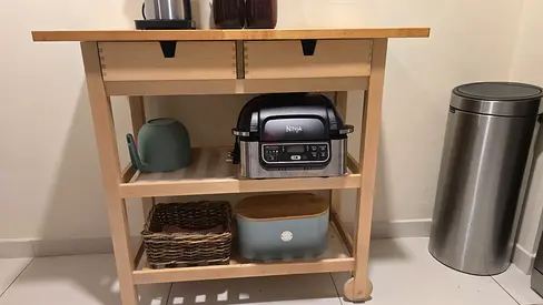 Small kitchen island cart with drawers and shelves - light wood