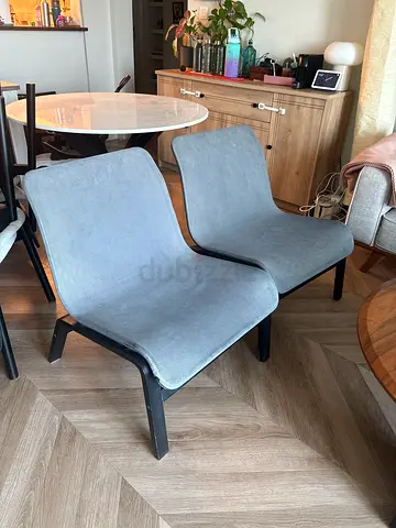 Pair of black mesh IKEA lounge chair  with black solid wood legs - good condition.