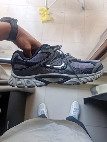 Used men's grey athletic sneakers - good condition, size available on request,Nike rnr v5