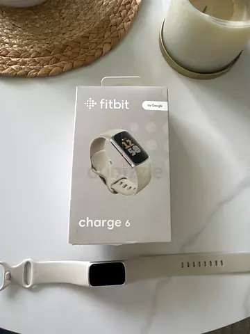 Fitbit Charge 6 in white with original box - one small scratch top left of screen (photographed).