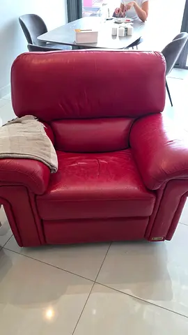 Red leather single recliner armchair - comfortable used condition