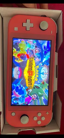 Nintendo Switch Lite Coral - Like new Excellent Condition