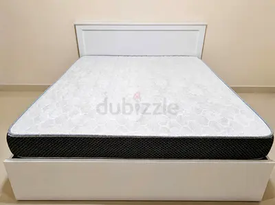Queen-size mattress in good condition (used) - firm support and one side soft