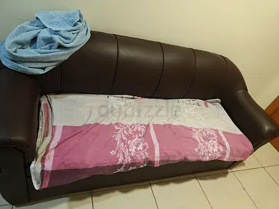 Brown leather 3-seater sofa in good used condition