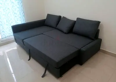 Modern Gray L-Shaped Sofa Bed with Pull Out Section