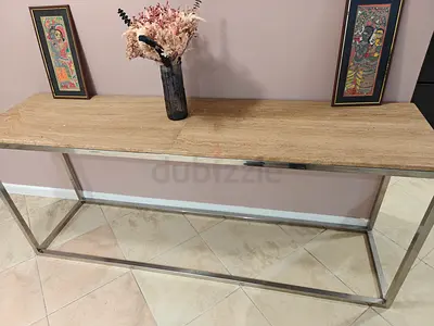 Console table with stainless steel frame and Traventine top