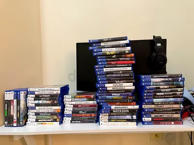 Large collection of PS4 games with monitor and headset - bundle
