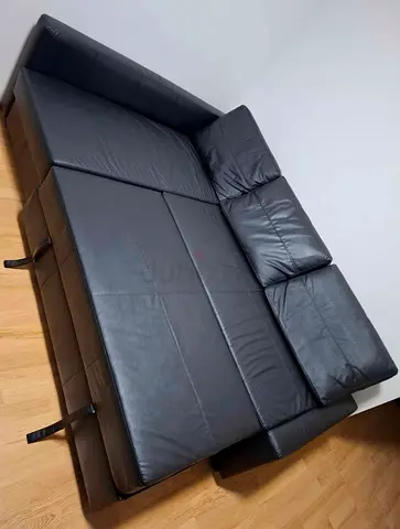 Black leather sofa bed - converts to double bed, good condition