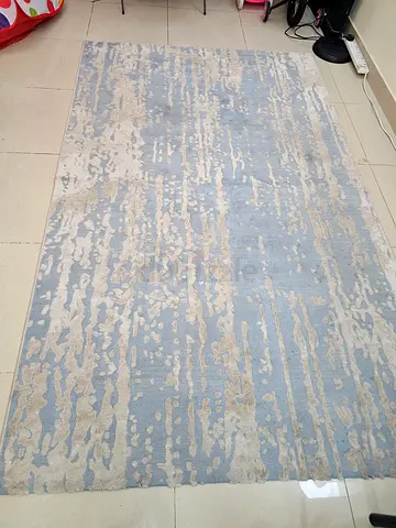 Light blue rug/carpet - good condition