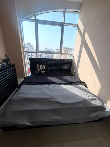 Double bed frame with headboard - solid black, good condition