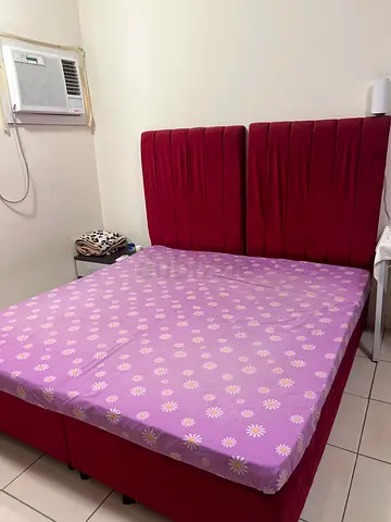 Red fabric double bed frame with mattress