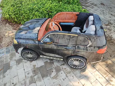 Kids BMW X7 Style Two-Seater Ride-On Car (Untested / For Parts or Repair)