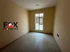2BR apartment in Al Jurf 3, brand new, first tenant, 2 master bedrooms, 3 bathrooms, balcony with a 