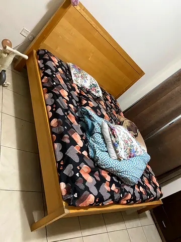 Solid wood double bed frame with headboard - good condition