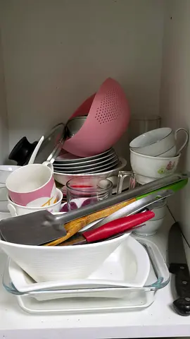 Mixed kitchen utensils and tableware set - bowls, plates, cups, serving dishes