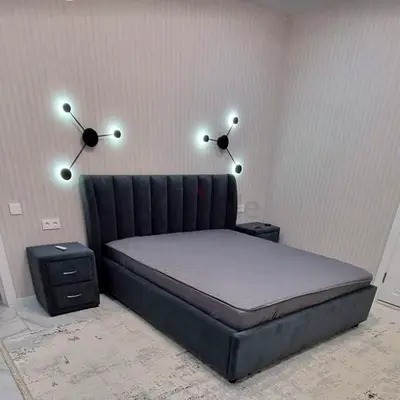 Modern grey upholstered double bed