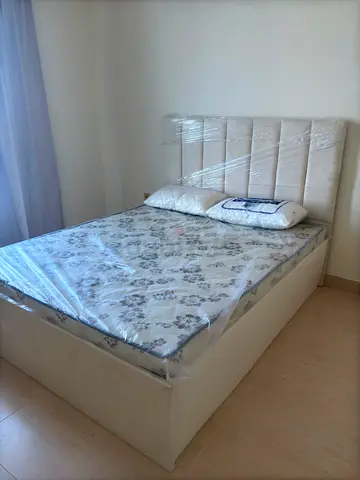 Bed with mattress