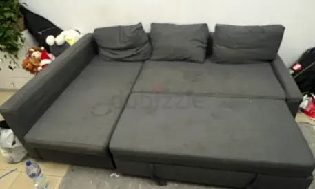 Used grey fabric sectional sofa bed with storage (3-seater, L-shape)