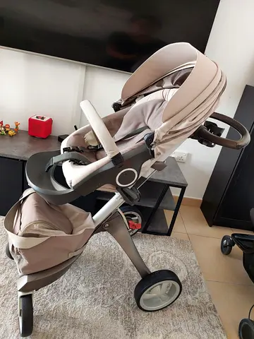Used beige standard stroller in good condition