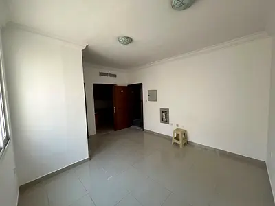 Studio for Annual Rent in Al Nuaimiya 2 Near Dubai Exit | Separate Kitchen & Central AC | AED 18K
