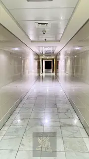 For annual rent in Sharjah: A 2-bedroom apartment with a separate hall and direct sea view, includin