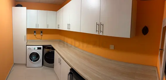 Kitchen or laundry cupboards
