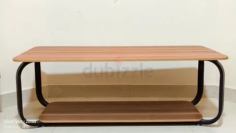 A double layer plywood tea table