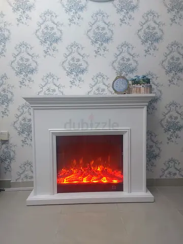 White freestanding electric fireplace mantel - decorative heater