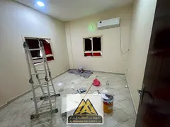 Studio in Al Rashidiya 3 near Grand Mall, separate room & kitchen, split AC. AED 18,007/year.