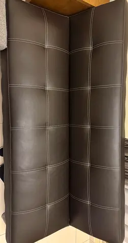 Dark brown faux leather 3-seater sofa bed - very good condition