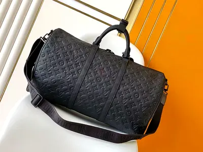 Luxurious Louis Vuitton Black Duffel Bag - Style Meets Function!
