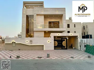 Spacious two-story villa with a roof terrace in Al Amerah—Freehold ownership; price includes registration and ownership fees.