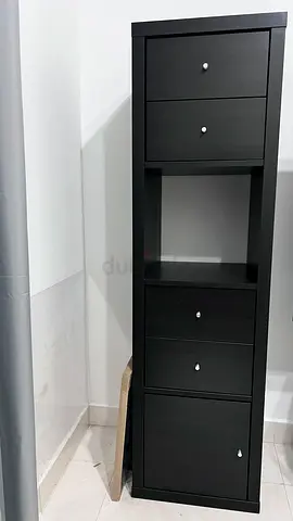 IKEA brown bookshelf with drawers